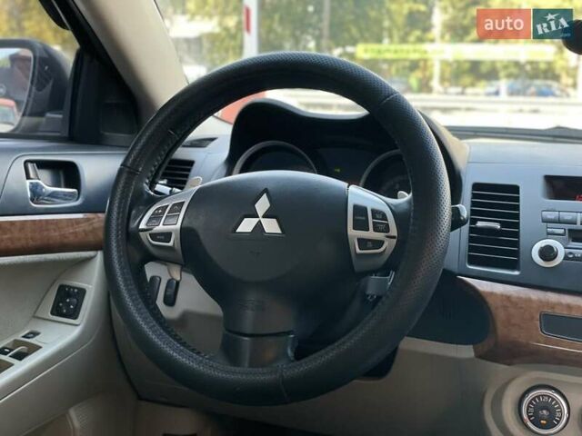 Сірий Міцубісі Lancer, об'ємом двигуна 2 л та пробігом 203 тис. км за 6999 $, фото 16 на Automoto.ua