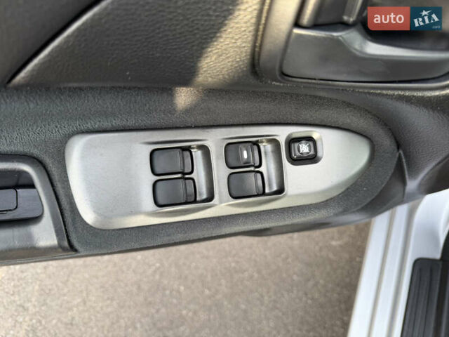 Серый Мицубиси Лансер, объемом двигателя 1.3 л и пробегом 160 тыс. км за 5555 $, фото 30 на Automoto.ua