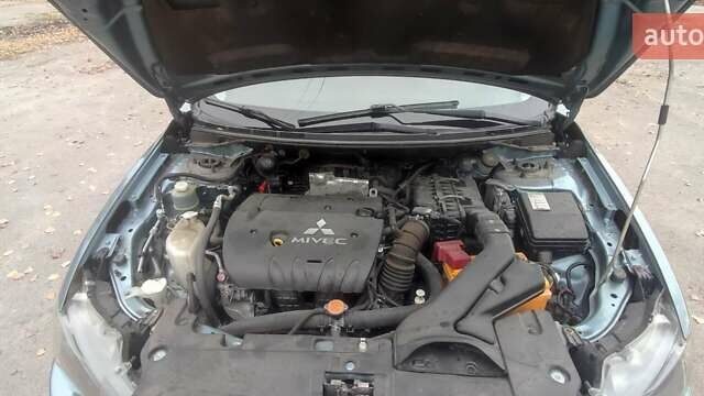 Сірий Міцубісі Lancer, об'ємом двигуна 2 л та пробігом 179 тис. км за 7700 $, фото 3 на Automoto.ua