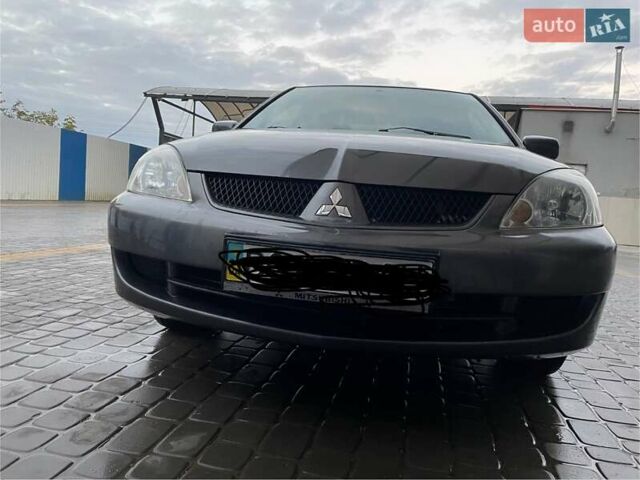 Сірий Міцубісі Lancer, об'ємом двигуна 1.6 л та пробігом 330 тис. км за 3500 $, фото 19 на Automoto.ua