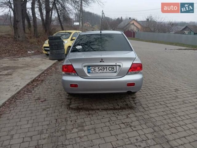 Серый Мицубиси Лансер, объемом двигателя 1.6 л и пробегом 175 тыс. км за 4200 $, фото 10 на Automoto.ua