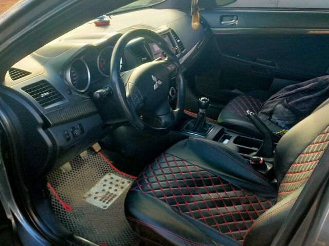 Серый Мицубиси Лансер, объемом двигателя 2 л и пробегом 351 тыс. км за 7000 $, фото 9 на Automoto.ua