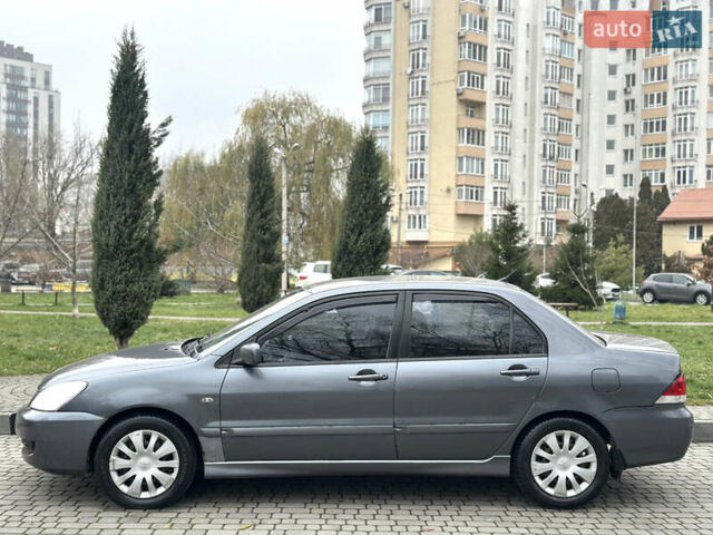 Сірий Міцубісі Lancer, об'ємом двигуна 1.6 л та пробігом 177 тис. км за 2800 $, фото 1 на Automoto.ua