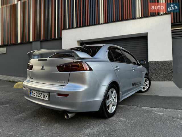 Сірий Міцубісі Lancer, об'ємом двигуна 2 л та пробігом 173 тис. км за 6800 $, фото 10 на Automoto.ua