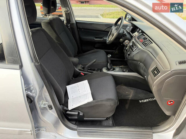 Сірий Міцубісі Lancer, об'ємом двигуна 1.3 л та пробігом 160 тис. км за 4999 $, фото 67 на Automoto.ua