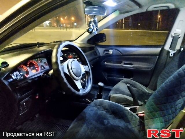 Сірий Міцубісі Lancer, об'ємом двигуна 2 л та пробігом 280 тис. км за 7000 $, фото 2 на Automoto.ua