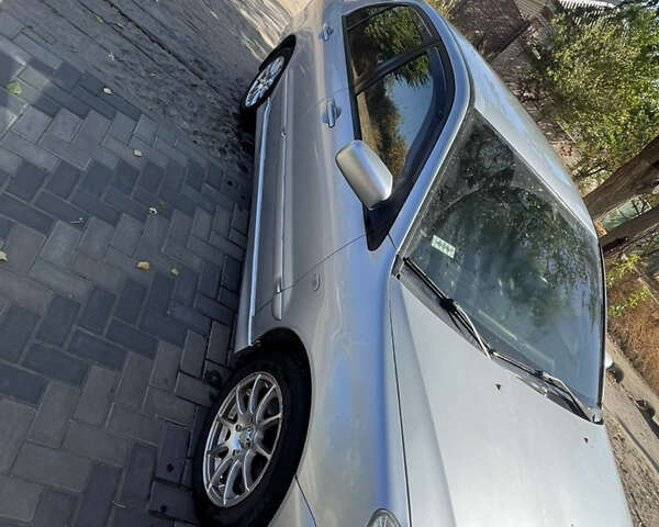 Сірий Міцубісі Lancer, об'ємом двигуна 1.58 л та пробігом 212 тис. км за 5600 $, фото 2 на Automoto.ua