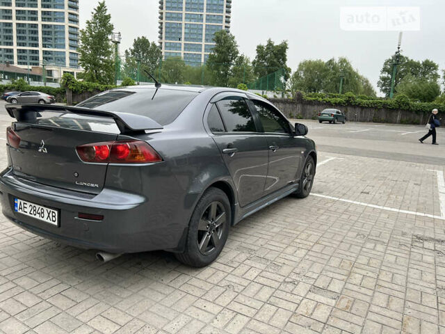 Сірий Міцубісі Lancer, об'ємом двигуна 2 л та пробігом 215 тис. км за 6900 $, фото 5 на Automoto.ua