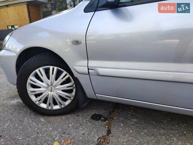 Сірий Міцубісі Lancer, об'ємом двигуна 1.58 л та пробігом 122 тис. км за 6300 $, фото 27 на Automoto.ua