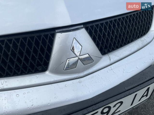 Серый Мицубиси Лансер, объемом двигателя 1.58 л и пробегом 232 тыс. км за 4900 $, фото 5 на Automoto.ua