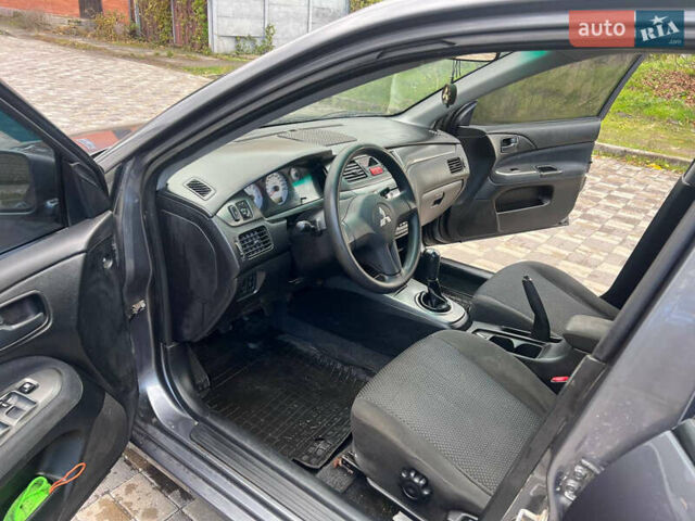 Міцубісі Lancer 2007 у Белой Церкве на Automoto.ua Сірий Міцубісі Lancer, об'ємом двигуна 1.58 л та пробігом 254 тис. км за 3200 $, фото 11 на Automoto.ua