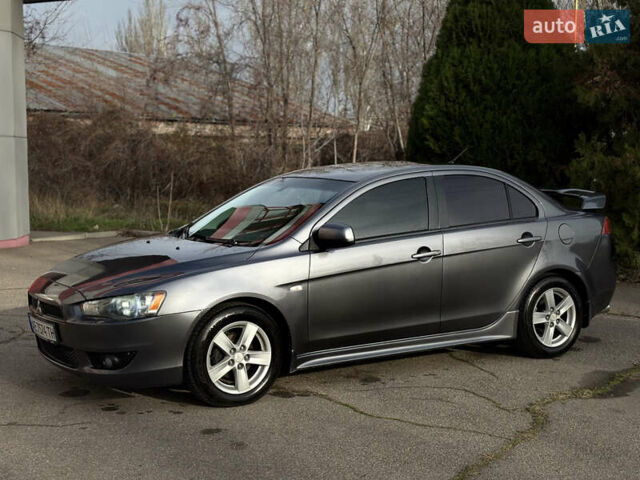 Сірий Міцубісі Lancer, об'ємом двигуна 2 л та пробігом 220 тис. км за 6800 $, фото 5 на Automoto.ua
