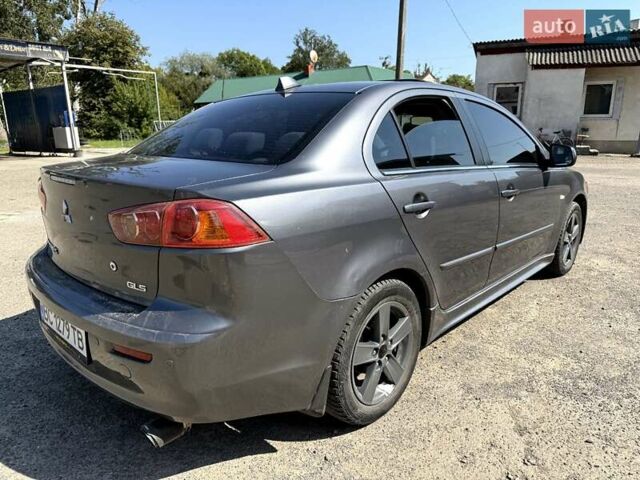 Сірий Міцубісі Lancer, об'ємом двигуна 2 л та пробігом 203 тис. км за 6200 $, фото 4 на Automoto.ua