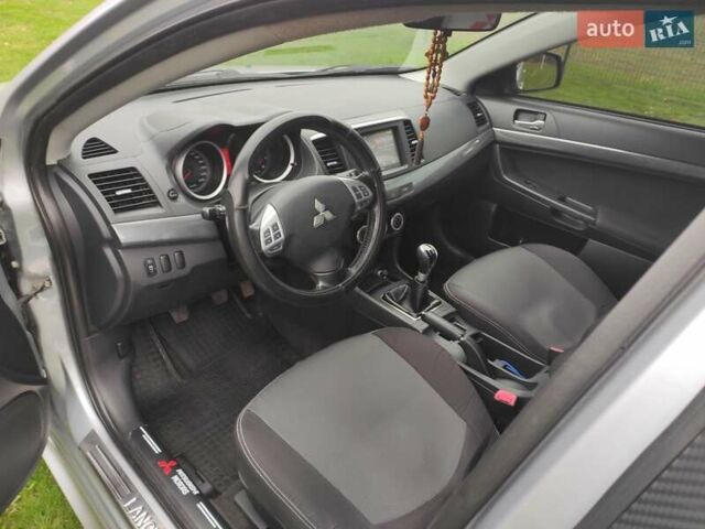 Сірий Міцубісі Lancer, об'ємом двигуна 2 л та пробігом 124 тис. км за 7499 $, фото 11 на Automoto.ua