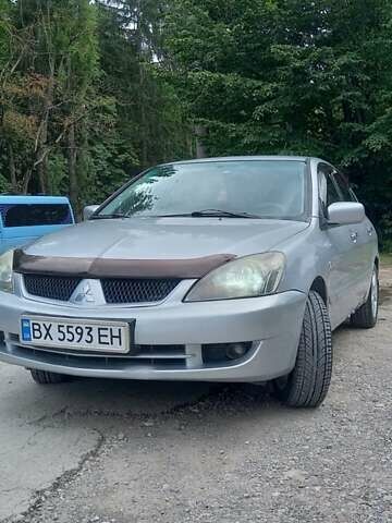 Сірий Міцубісі Lancer, об'ємом двигуна 1.6 л та пробігом 298 тис. км за 4100 $, фото 7 на Automoto.ua