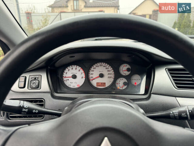 Сірий Міцубісі Lancer, об'ємом двигуна 1.6 л та пробігом 281 тис. км за 3999 $, фото 23 на Automoto.ua