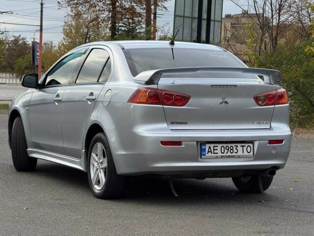 Серый Мицубиси Лансер, объемом двигателя 2 л и пробегом 207 тыс. км за 5800 $, фото 9 на Automoto.ua