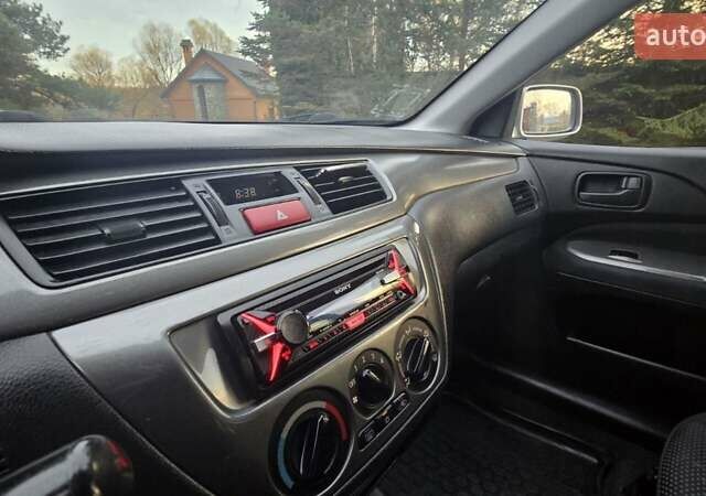 Сірий Міцубісі Lancer, об'ємом двигуна 1.6 л та пробігом 213 тис. км за 3600 $, фото 20 на Automoto.ua