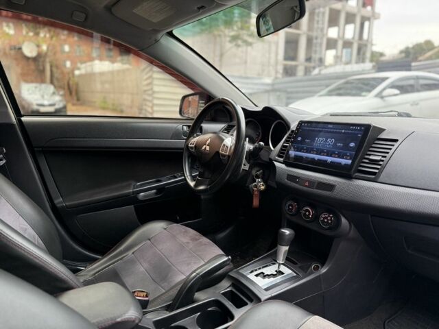 Сірий Міцубісі Lancer, об'ємом двигуна 2 л та пробігом 220 тис. км за 6400 $, фото 9 на Automoto.ua
