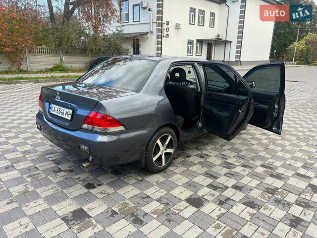Міцубісі Lancer 2007 у Белой Церкве на Automoto.ua Сірий Міцубісі Lancer, об'ємом двигуна 1.58 л та пробігом 254 тис. км за 3200 $, фото 8 на Automoto.ua