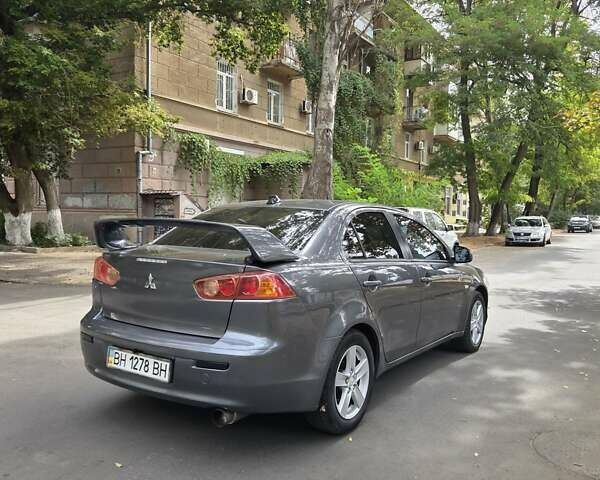 Сірий Міцубісі Lancer, об'ємом двигуна 2 л та пробігом 190 тис. км за 7100 $, фото 4 на Automoto.ua