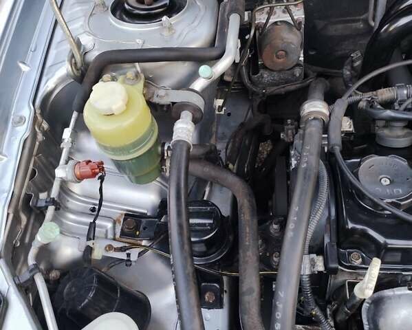 Сірий Міцубісі Lancer, об'ємом двигуна 1.58 л та пробігом 122 тис. км за 6300 $, фото 45 на Automoto.ua