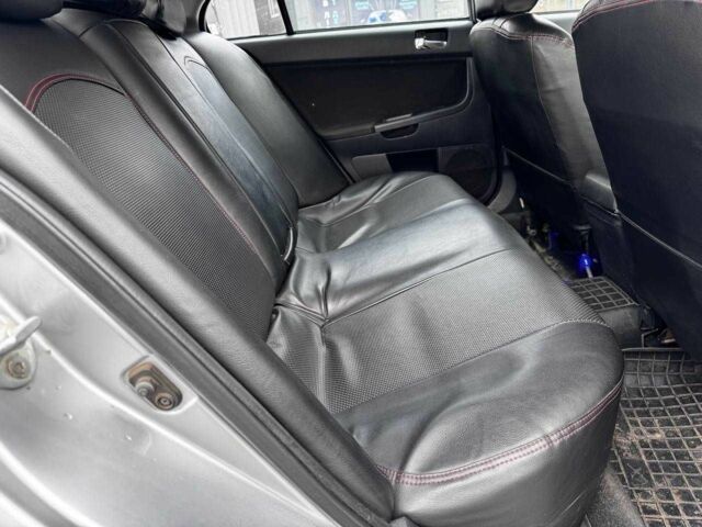 Сірий Міцубісі Lancer, об'ємом двигуна 2 л та пробігом 150 тис. км за 6700 $, фото 9 на Automoto.ua