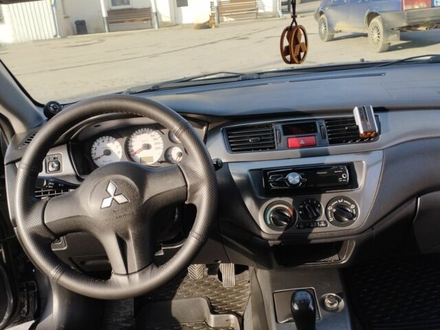 Сірий Міцубісі Lancer, об'ємом двигуна 1.6 л та пробігом 178 тис. км за 5464 $, фото 3 на Automoto.ua