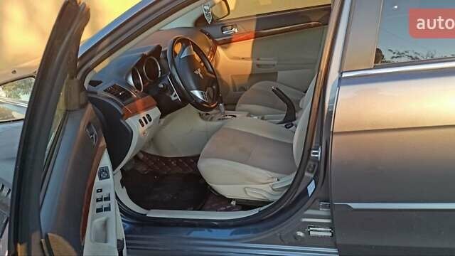 Сірий Міцубісі Lancer, об'ємом двигуна 2 л та пробігом 240 тис. км за 9500 $, фото 7 на Automoto.ua