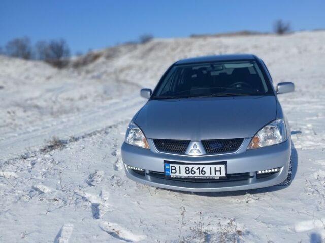 Серый Мицубиси Лансер, объемом двигателя 1.6 л и пробегом 277 тыс. км за 4599 $, фото 2 на Automoto.ua