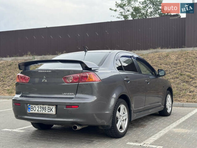 Сірий Міцубісі Lancer, об'ємом двигуна 2 л та пробігом 222 тис. км за 6300 $, фото 11 на Automoto.ua