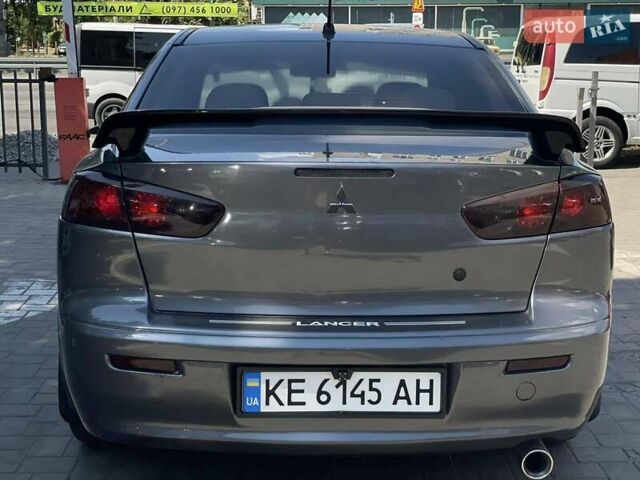 Сірий Міцубісі Lancer, об'ємом двигуна 2 л та пробігом 203 тис. км за 6999 $, фото 4 на Automoto.ua