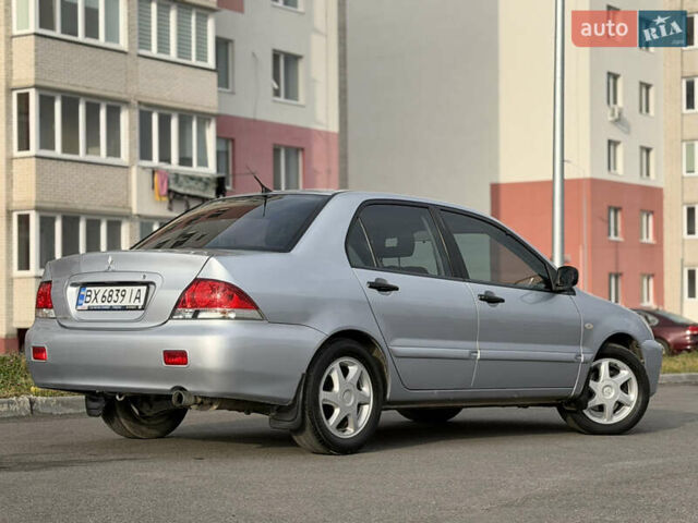 Сірий Міцубісі Lancer, об'ємом двигуна 1.3 л та пробігом 160 тис. км за 4999 $, фото 12 на Automoto.ua