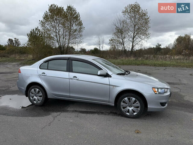 Серый Мицубиси Лансер, объемом двигателя 1.5 л и пробегом 97 тыс. км за 7300 $, фото 2 на Automoto.ua