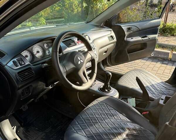Мицубиси Лансер 2007 в Днепре (Днепропетровске) на Automoto.ua Серый Мицубиси Лансер, объемом двигателя 1.6 л и пробегом 220 тыс. км за 3500 $, фото 5 на Automoto.ua