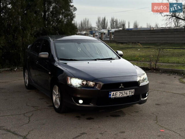 Сірий Міцубісі Lancer, об'ємом двигуна 2 л та пробігом 220 тис. км за 6800 $, фото 11 на Automoto.ua