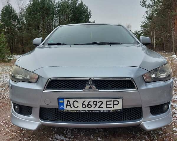 Сірий Міцубісі Lancer, об'ємом двигуна 1.8 л та пробігом 241 тис. км за 7100 $, фото 1 на Automoto.ua