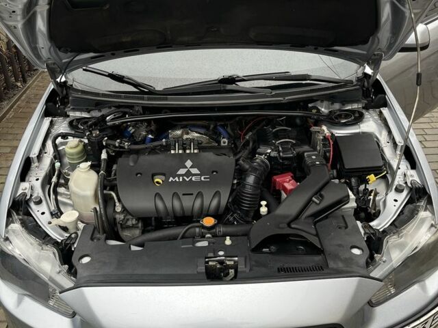 Серый Мицубиси Лансер, объемом двигателя 2 л и пробегом 227 тыс. км за 6600 $, фото 7 на Automoto.ua