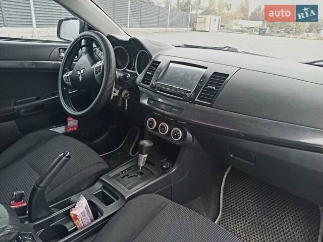 Сірий Міцубісі Lancer, об'ємом двигуна 2 л та пробігом 268 тис. км за 5555 $, фото 10 на Automoto.ua