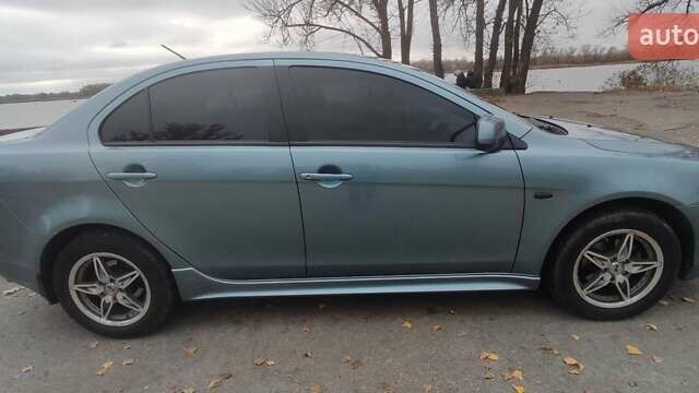 Сірий Міцубісі Lancer, об'ємом двигуна 2 л та пробігом 179 тис. км за 7700 $, фото 12 на Automoto.ua