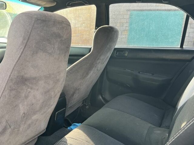 Серый Мицубиси Лансер, объемом двигателя 1.6 л и пробегом 200 тыс. км за 2300 $, фото 5 на Automoto.ua