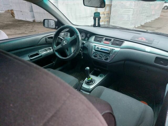 Серый Мицубиси Лансер, объемом двигателя 1.6 л и пробегом 220 тыс. км за 4200 $, фото 6 на Automoto.ua