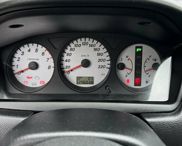 Сірий Міцубісі Lancer, об'ємом двигуна 1.58 л та пробігом 176 тис. км за 4700 $, фото 13 на Automoto.ua