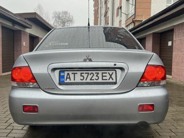 Сірий Міцубісі Lancer, об'ємом двигуна 1.6 л та пробігом 272 тис. км за 4500 $, фото 3 на Automoto.ua