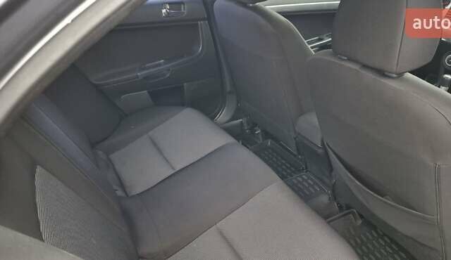 Серый Мицубиси Лансер, объемом двигателя 2 л и пробегом 189 тыс. км за 6800 $, фото 9 на Automoto.ua