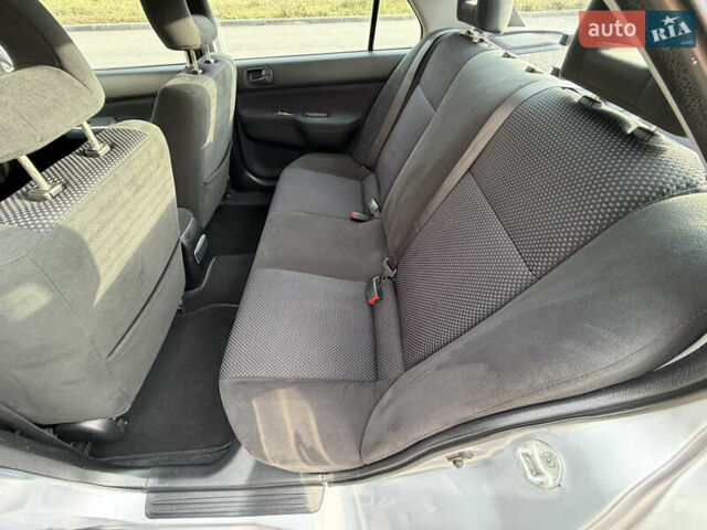 Сірий Міцубісі Lancer, об'ємом двигуна 1.3 л та пробігом 160 тис. км за 4999 $, фото 60 на Automoto.ua