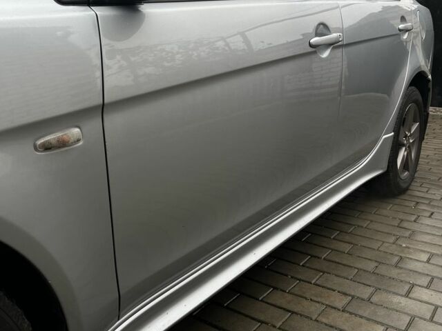 Серый Мицубиси Лансер, объемом двигателя 2 л и пробегом 227 тыс. км за 6600 $, фото 4 на Automoto.ua