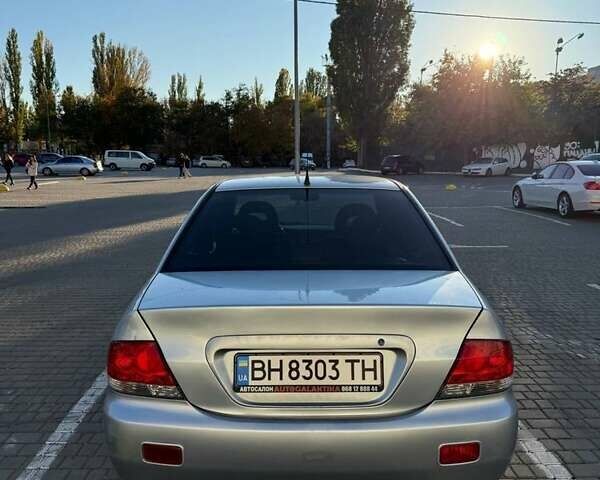 Сірий Міцубісі Lancer, об'ємом двигуна 1.6 л та пробігом 174 тис. км за 4800 $, фото 2 на Automoto.ua
