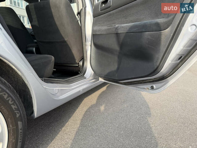 Серый Мицубиси Лансер, объемом двигателя 1.3 л и пробегом 160 тыс. км за 5555 $, фото 57 на Automoto.ua