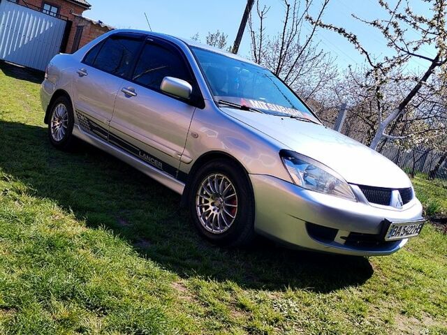 Сірий Міцубісі Lancer, об'ємом двигуна 1.6 л та пробігом 280 тис. км за 4800 $, фото 4 на Automoto.ua